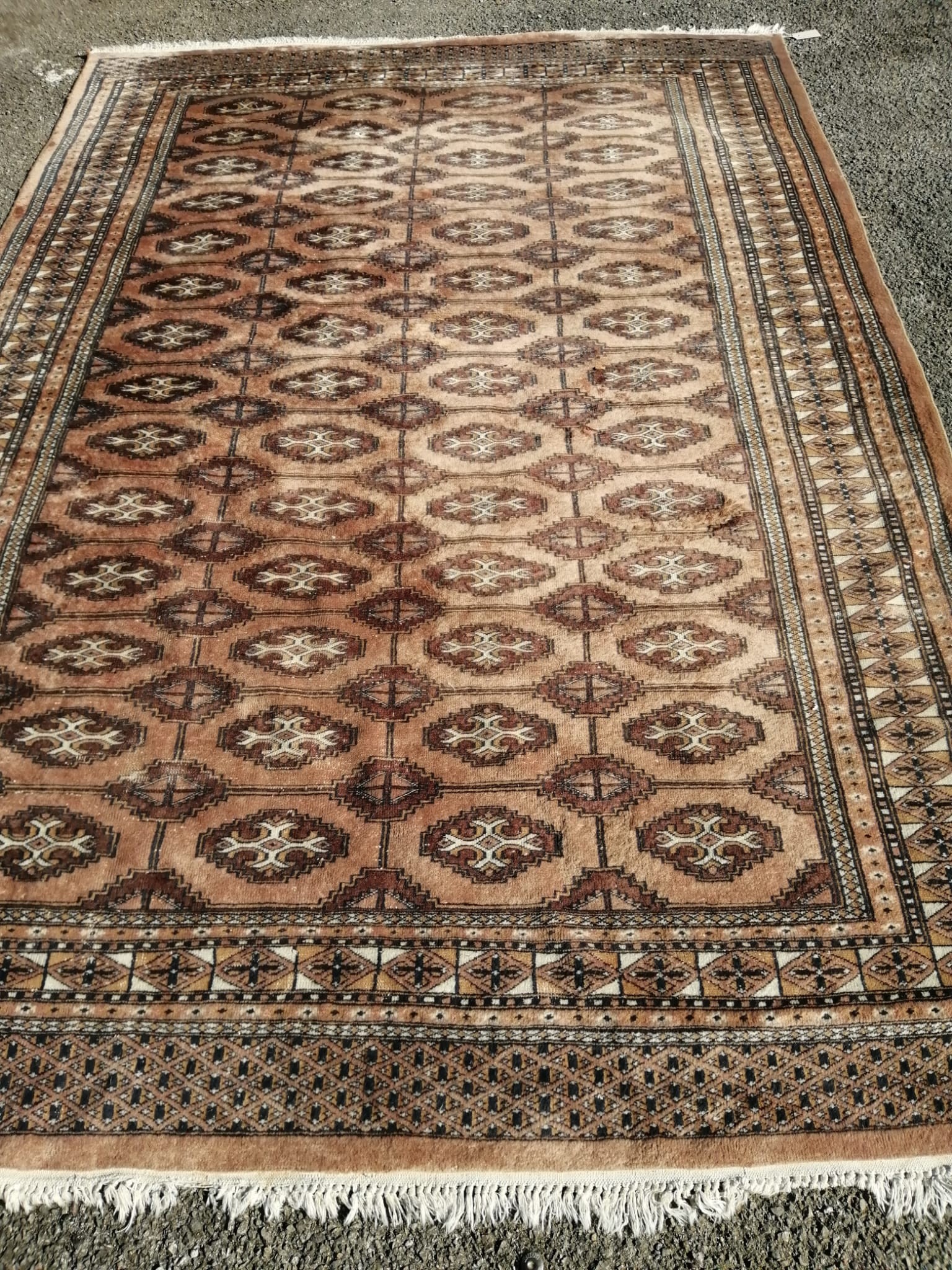 A Bokhara peach ground carpet, 280 x 186cm